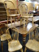 ANTIQUE MAHOGANY EXTENDING DINING TABLE, together with 5+1 later hoop back Windsor chairs (7)