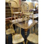 ANTIQUE MAHOGANY EXTENDING DINING TABLE, together with 5+1 later hoop back Windsor chairs (7)