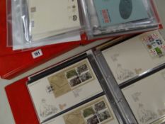 TWO ALBUMS OF THE FIRST WORLD WAR COLLECTION with presentation sheets, related coin issues (red) (