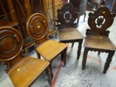 TWO PAIRS OF ANTIQUE HALL CHAIRS (4)