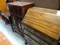 REPRODUCTION MAHOGANY FURNITURE: two-door glazed bookcase with drawers, antique serpentine side