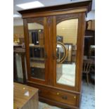 EDWARDIAN MAHOGANY CARVED DOUBLE WARDROBE with two mirrors and base drawer