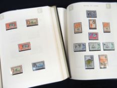 TWO ALBUMS OF STAMPS LABELLED AS BRITISH COMMONWEALTH VOLUME I & II comprehensively and tidily