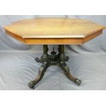 OCTAGONAL TOP VICTORIAN TABLE on fancy gilt highlighted four-column four-footed ebonized and