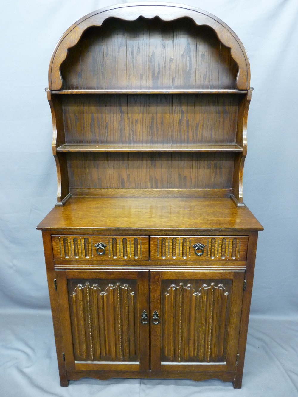 PRIORY-STYLE OAK DUTCH TOP DRESSER, 177cms high x 95cms wide x 44cms deep with linen fold carved