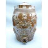 SALT GLAZED STONEWARE BARREL having recumbent lions and other detail in relief, 40cms high