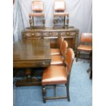 CARVED OAK VINTAGE DINING SUITE consisting of railback sideboard, 103cms overall height x 183cms
