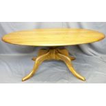 ERCOL OVAL COFFEE TABLE on four splayed supports, 51cms high x 122cms long x 77cms wide