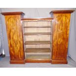 EARLY VICTORIAN MAHOGANY BOOKCASE with central open section and flanking pedestal-type cabinets with