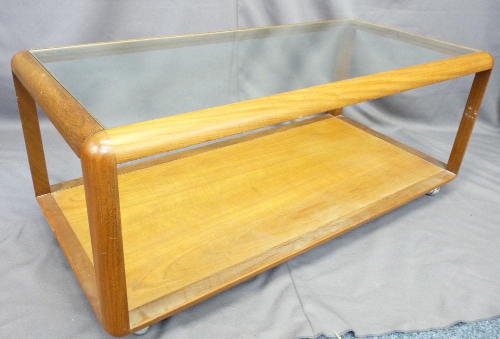 MID-CENTURY G-PLAN STYLE TEAK GLASS TOP COFFEE TABLE with under tier shelf on chrome castors,