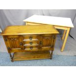PRIORY-STYLE OAK SMALL SIDEBOARD of three central drawers and linen fold carved cupboard doors above