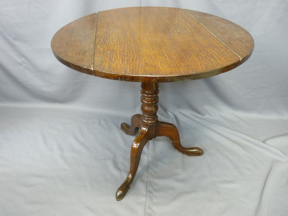 ANTIQUE OAK TWIN-FLAP TILT TOP TABLE turned column tripod base, 73.5cms high x 78cms diam. top x