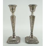 PAIR GEORGE V SILVER CANDLESTICKS, Chester 1912, tapering square form, loaded bases, 22.5cms high (
