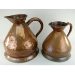 TWO ANTIQUE COPPER MEASURING JUGS the larger stamped with 4 gallons, the smaller 2 gallons, both