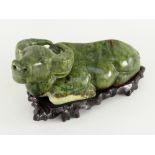 REPUBLICAN CHINESE GREEN MINERAL MODEL OF A RECLINING BUFFALO boxed and with hardwood stand, buffalo