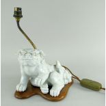 CHINESE CHENIN BLANC DOG OF FO TABLE LAMP in seated position with front paw raised, mounted to a