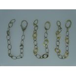 TWO WHITE METAL & GOLD OVAL LINK NECKLACES, 29.7grms and a similar all-white metal bracelet, 17grms,