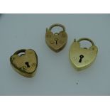 TWO NINE CARAT GOLD PADLOCKS, 5.4grms and a yellow metal (non-gold) padlock