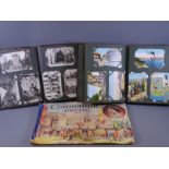 TWO VINTAGE POSTCARD ALBUMS and a Coronation scrapbook, over four hundred postcards, British and