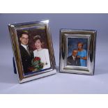 SILVER EASEL PHOTO FRAMES, a pair, each of plain form to take images 12.5 x 8.5cms, Sheffield 1996