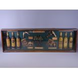 REPRODUCTION DISPLAY CASE OF WINE COLLECTABLES, 33cms high, 106cms long, 10cms deep