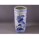20TH CENTURY BLUE & WHITE POTTERY UMBRELLA STAND with floral and cloud decoration, 38cms H
