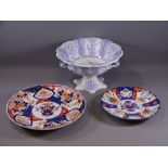 VICTORIAN BLUE & WHITE PEDESTAL FRUIT BOWL and two Japanese Imari wall chargers