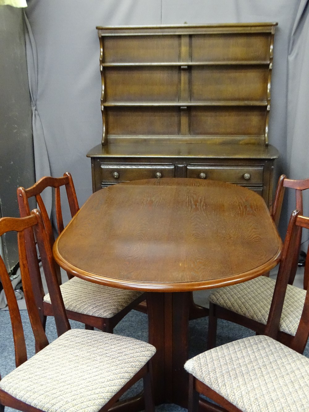 PRIORY STYLE OAK DRESSER and a reproduction mahogany dining table and four chairs with upholstered