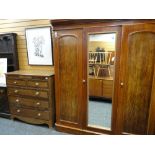 VICTORIAN MAHOGANY TRIPLE WARDROBE, arched panel doors and replaced mirror centre, 178cms wide x