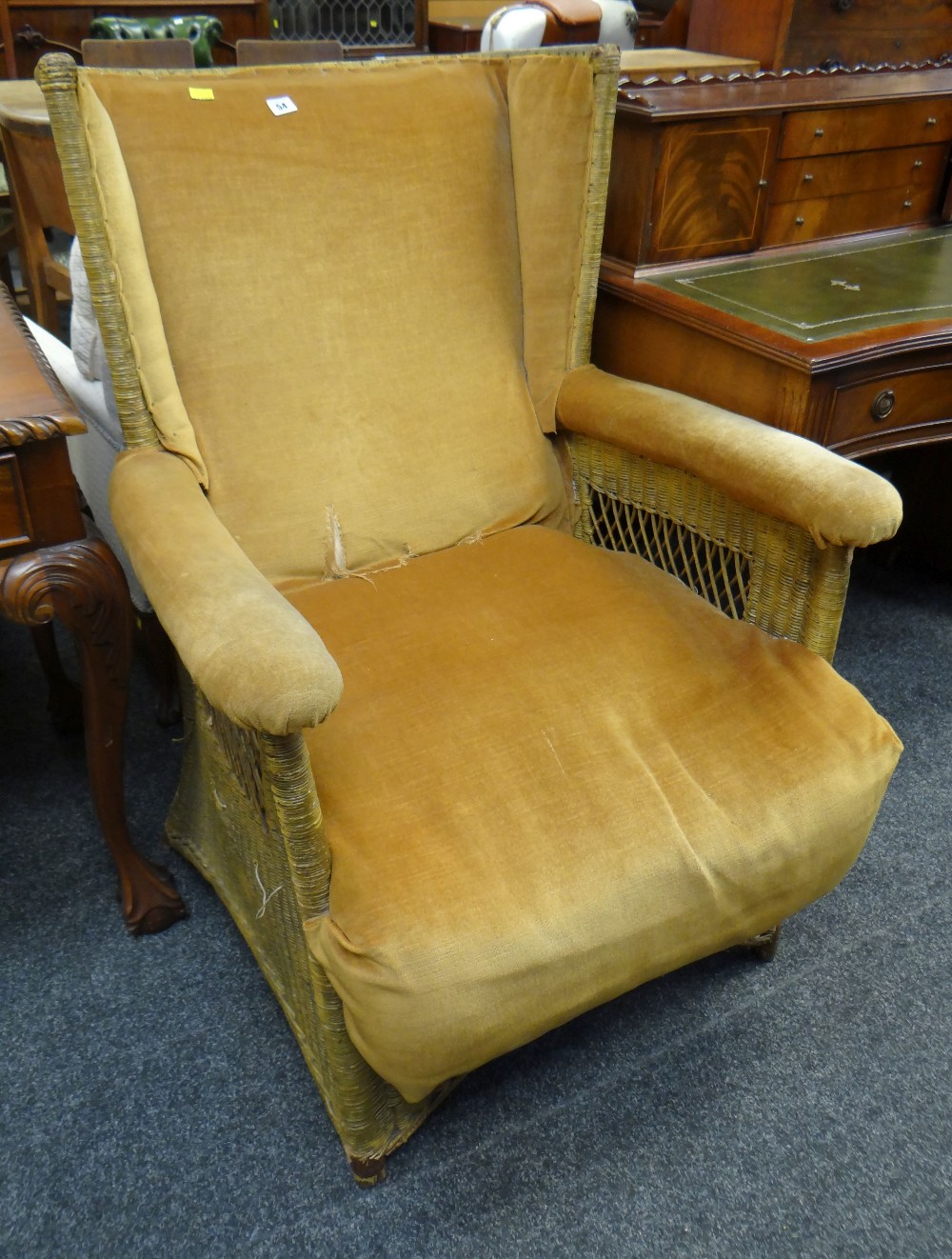 VINTAGE WICKER WING BACK ARMCHAIR with upholstered seat and arms