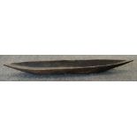 SMALL RIVER CANOE SHAPE FEAST BOWL, probably West African, 188cms