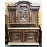 IMPRESSIVE 19TH CENTURY FLEMISH WALNUT CABINET, arched top with carved doors divided by fluted