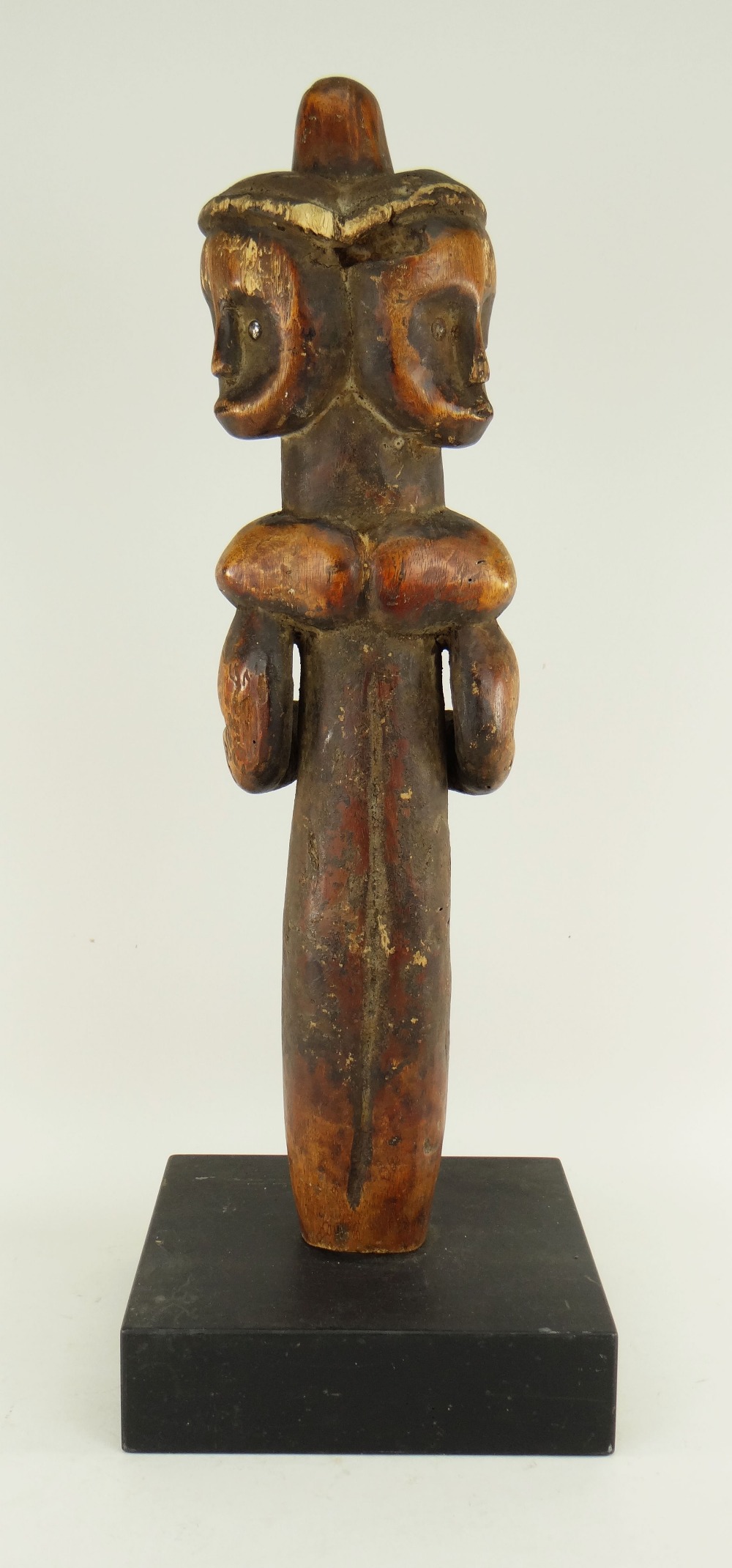 FANG RELIQUARY GUARDIAN FIGURE with three faces, 51cms high - Image 2 of 2