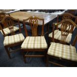 SET OF SIX WEST WALES GEORGIAN OAK DINING CHAIRS with solid seats and loose cushion covers, circa