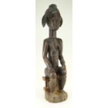 LARGE BAULE SEATED FEMALE FIGURE, 80cms high