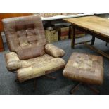 MOBEL (SWEDEN) BROWN LEATHER SWIVEL ARMCHAIR & MATCHING STOOL Condition Report: leather worn all