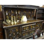 EARLY 20TH CENTURY JACOBEAN-STYLE CARVED OAK SIDEBOARD with stage back, 183 x 61 x 174cms