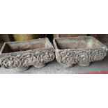 PAIR OF DECORATIVE MOULDED CONCRETE PLANTERS decorated with Renaissance-style figural lattice