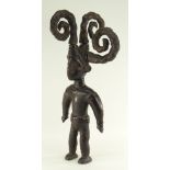 EKOI STANDING MALE FIGURE with four socketed coiled braids, 61cms high Condition Report: one braid