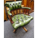 VICTORIAN-STYLE GREEN LEATHER UPHOLSTERED SWIVEL CHAIR