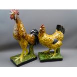 TWO LARGE COCKEREL ORNAMENTS, the tallest 54cms H