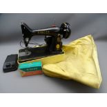 SINGER 99K SEWING MACHINE with foot pedal in a plastic stand with vinyl cover