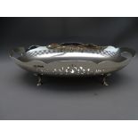 SILVER OVAL FRUIT BOWL with pierced edge and scalloped rim, standing on four pad feet, 357grms, 24.