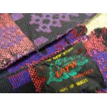 TWO TRADITIONAL WELSH WOOLLEN BLANKETS, matching purple tones in classical reversible patterns,