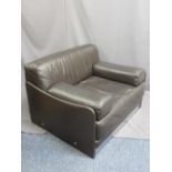 MODERN BROWN LEATHER EFFECT OVERSIZED EASY ARMCHAIR with chrome detail, 72cms H, 106cms W, 62cms D