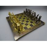 LACQUERED BRASS CHESS BOARD and cast metal bronze and brass effect chess set
