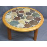 STYLISH MID CENTURY CIRCULAR COFFEE TABLE set with circular pottery discs of various sizes, framed