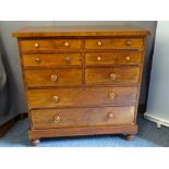 VICTORIAN MAHOGANY CHEST of six short over two long drawers with turned wooden knobs on a platform