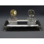 EDWARDIAN SILVER PARTNER INKSTAND with rope and swags border and on four raised fretwork legs, two