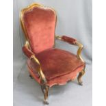 VICTORIAN ROSEWOOD CAMEO BACK ARMCHAIR with Rococo type scrollwork, on brass castors, 97cms H, 69cms